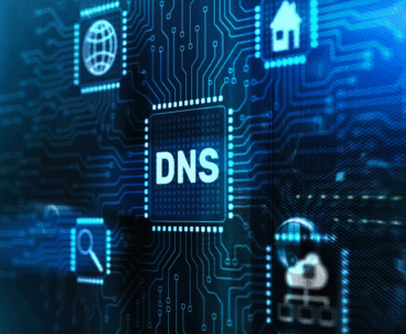 A circuit board with a processor chip at the center reading "DNS"