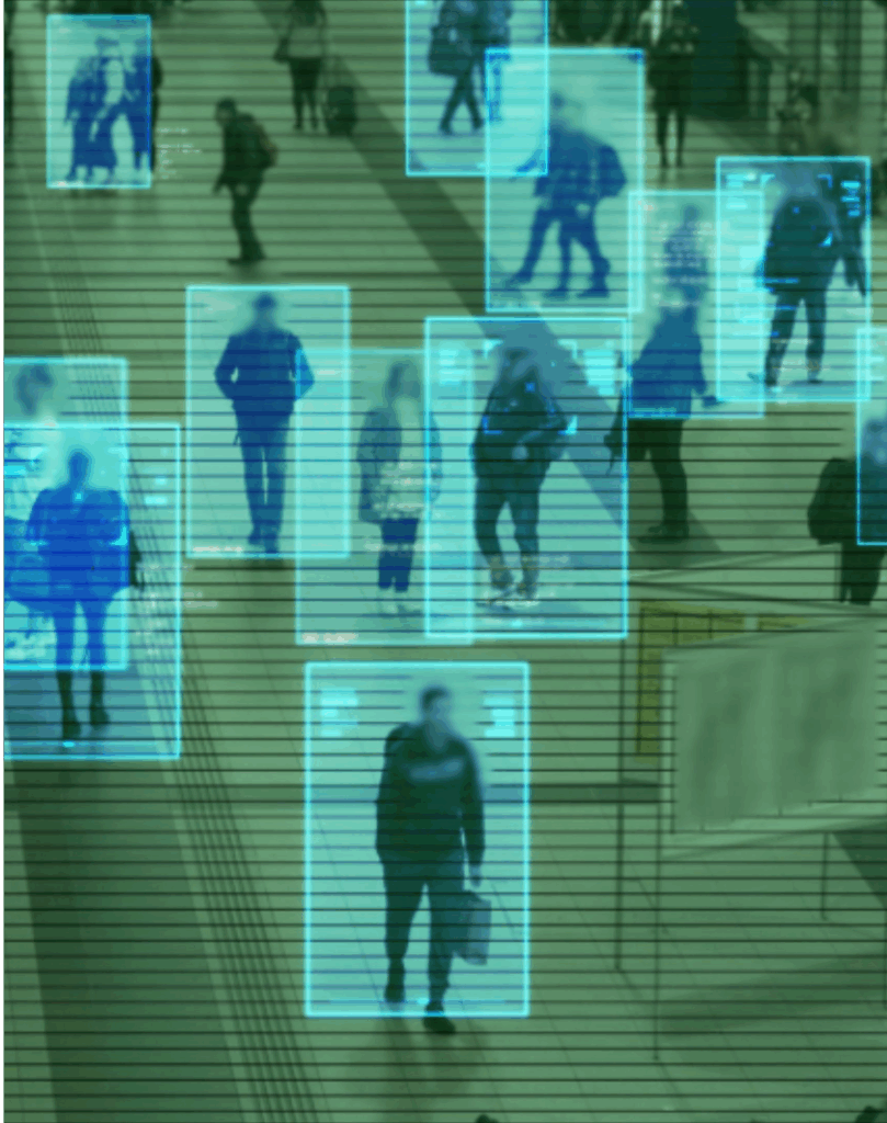 Several people are walking in a public place and each figure is highlighted with a box, implying that they are being watched like you would be on some free vpns.