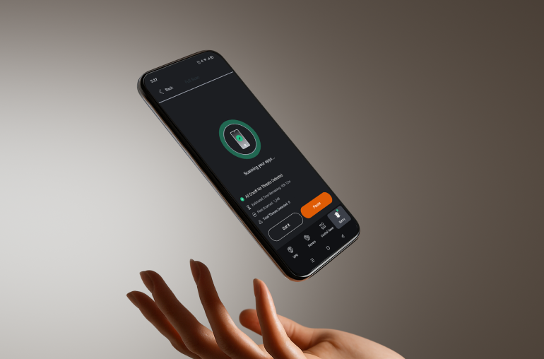 A closeup of a hand tossing an Android phone with the PrivadoVPN app on the screen.