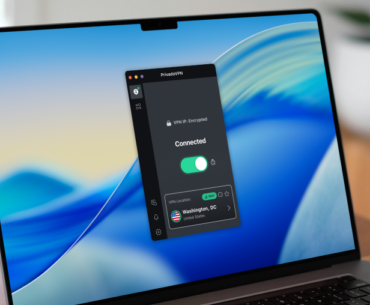 An Apple laptop sitting on a brightly-lit desk. The PrivadoVPN app for macOS is on the screen.